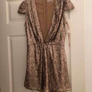 Tobi gold sequin romper. Size medium.